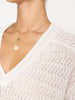 Leia open stitch V-neck white sweater close up