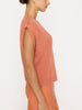 Frances orange V-neck sweater top side view