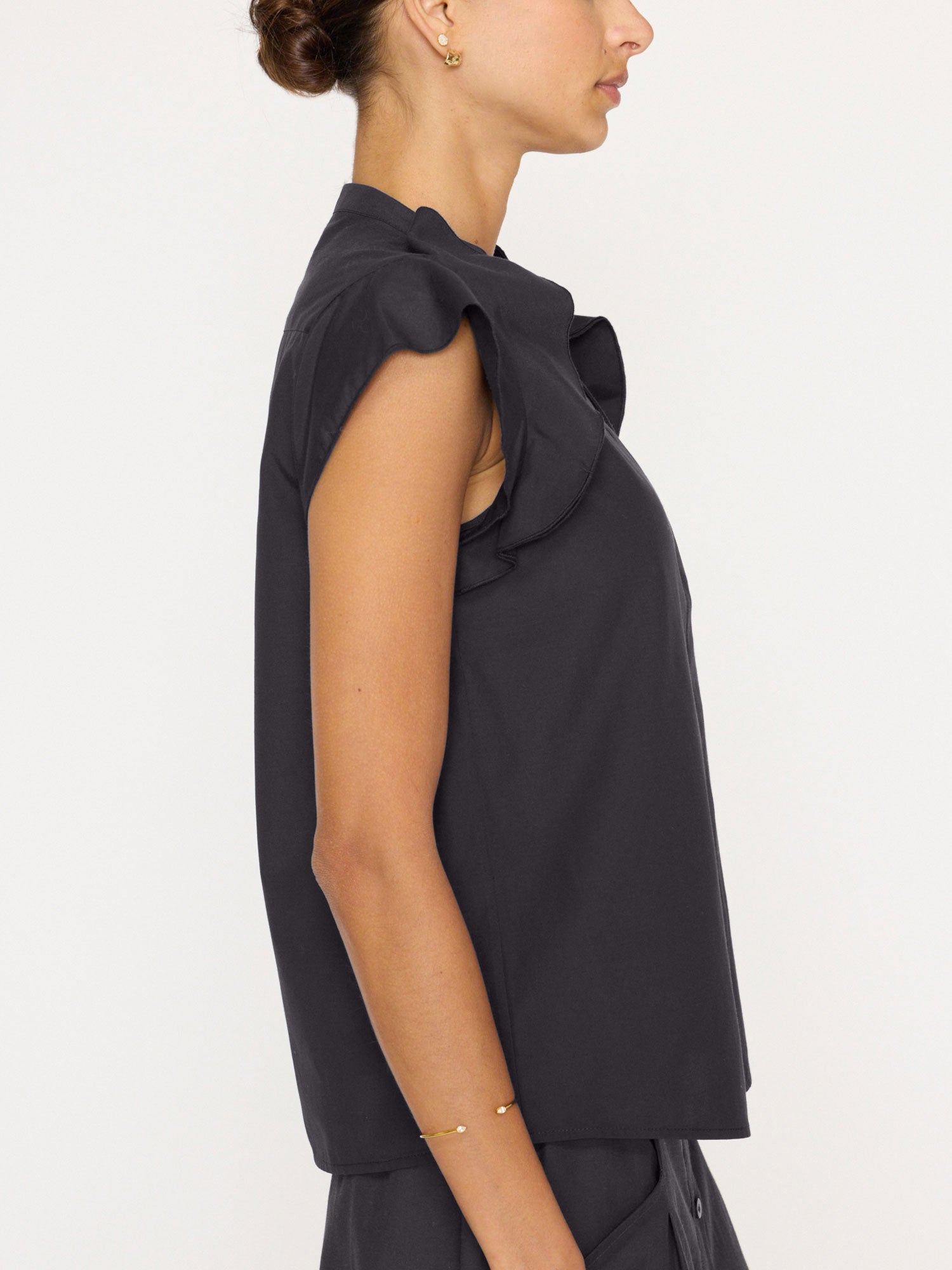 Anya ruffle sleeveless black blouse side view