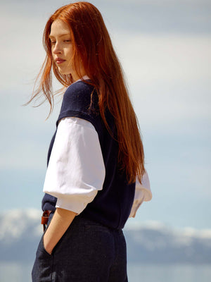 Kate navy vest overlayer white shirt side view