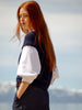 Kate navy vest overlayer white shirt side view