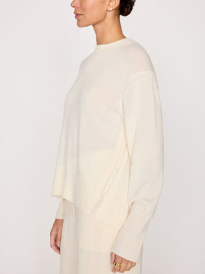 Fenton ivory crewneck fringe sweater side view 2