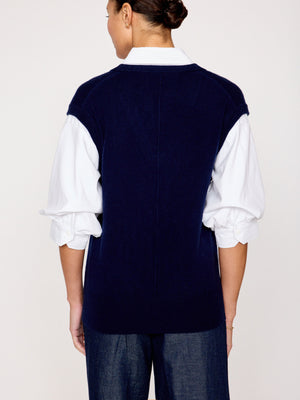 Kate navy vest overlayer white shirt back view