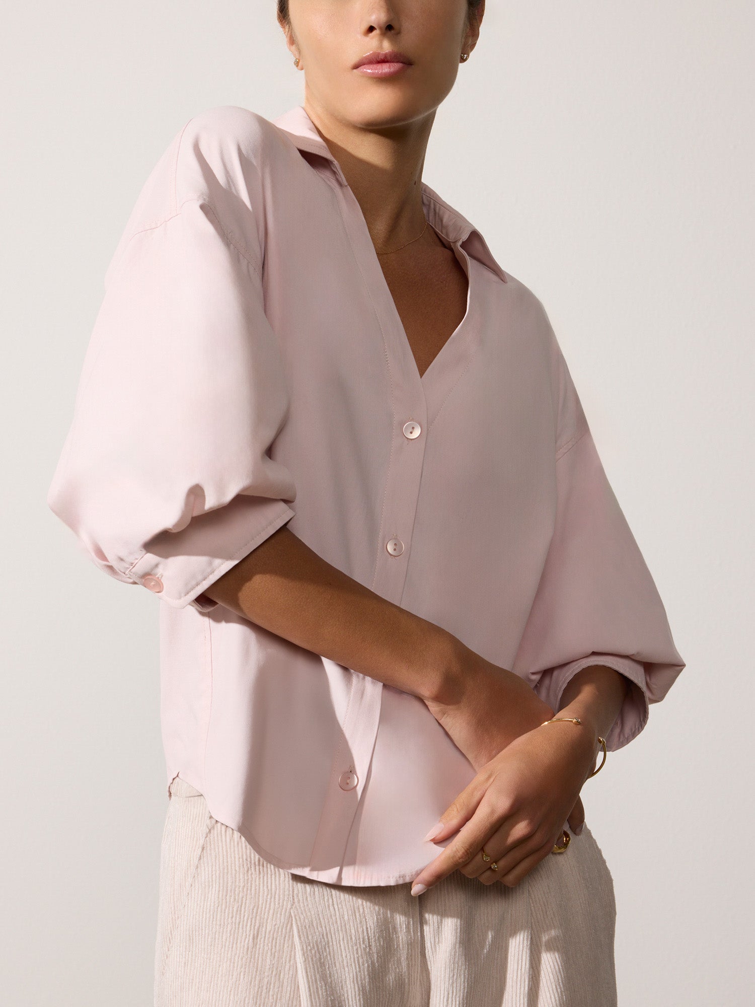 Kate V-neck button up pink shirt front view