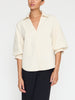 Kate V-neck button up beige shirt front view 2