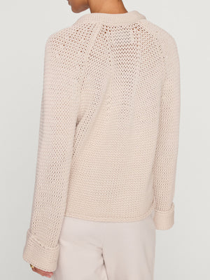 Aria stand collar deep v neckline beige sweater back view