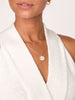 June sleeveless halter neckline white top close up